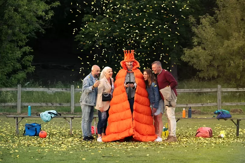 Allente celebrating on football field